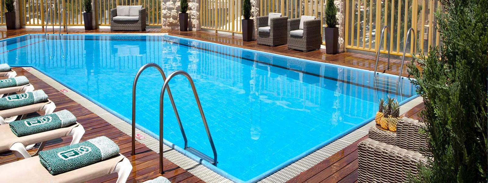 Experience the Dan Panorama Jerusalem Facilities & Services Hotel's Swimming Pool Picture